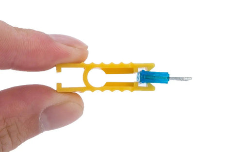 Car Mini Blade ATM Fuse Set 140 Piece Assortment with color coded fuse and yellow extractor in hand.