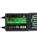 Close-up of Six Channel 2.4GHz AFHDS2A Receiver with Dual Antennas, model FS-iA6B, showing the ports and labels for RC gear compatibility