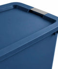 Close-up of the lid on a Massive 45 Gallon Rolling Storage Tote With Easy Glide Wheels in blue, featuring a secure side lid.