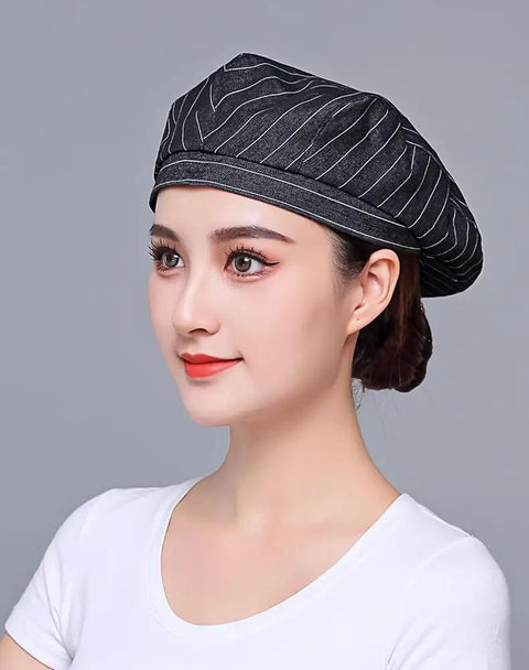 Custom Logo Chef Beret And Barista Hat For Kitchen Crew Offering Breathable Embroidered Name Cook Skullcap In Sleek Black Slick Go To Food Service Gear worn by a woman.
