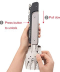 Hands demonstrating how to unlock the Six In One Folding Grill Utensils Set Featuring Fork Spatula Knife Tongs Bottle Opener And Corkscrew For Fourteen Inch Portable Backyard BBQ And Camping Gear.