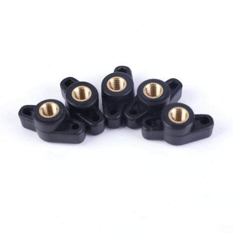 Ten black plastic 1/4-inch wing knobs with brass threaded inserts for T-track accessories and woodworking jigs
