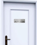Heavy Duty Stainless Steel Do Not Enter Sign For Restricted Areas With Solid Peel And Stick Backing on a white door.