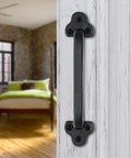 Rustic 9 Inch Cast Iron Sliding Barn Door Handle 2 Pack Black Vintage Gate Pull For Interior Doors Cabinets Drawers Outdoor Garage Closet Durable Cast Iron Construction Rust Resistant Matte Black Finish Easy Install Antique Style Hardware For Barn Doors installed on white door