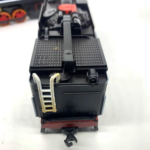Rear view of Vintage HO Scale Steam Locomotive Model Train With Black Body And Red Wheels Green Accents 13 Inch Long Realistic Detail