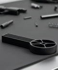 Lockdown Gun Vise Block For AR Rifle And Glock Pistol Heavy Steel Table Fixture Black Non Slip Grip built tough gunsmithing tool close-up