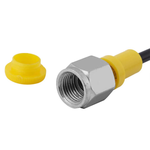 Close-up of Pro Grade Heavy Duty Hydraulic Test Hose With Nylon Lining And Polyurethane Cover; yellow cap removed; threaded metal end visible.
