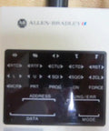 Close-up of 1745-PT1/A SLC SER A Interface Converter Programmer showing address, data, and mode labels, part of PLC tool.