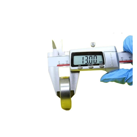 Digital caliper measuring 13.00 mm for accurate sizing of Get Your Hands On This Awesome 6302 Hybrid Ceramic Bearing.