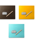 Three silicone baking mats in brown, yellow, and blue with rolling pins and dough scrapers.