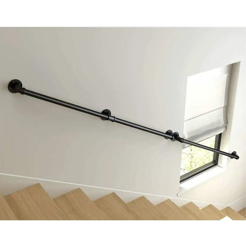 Straight Up Rock Solid Black Iron Railing For Indoor And Outdoor Use Adjustable Height Safety Guardrail With Rustproof Finish For Decks Patios And Staircase Installation along a staircase.