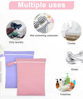 Two Pack Reusable Wet Bags With Handles And Zippers Ultra Lightweight Waterproof Cloth Diaper And Laundry Bags In Pink And Purple showing multiple uses