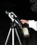 High Powered 150X Portable Telescope With 70mm Aperture HD Refractor Dope Optics Tripod Phone Adapter in use for stargazing