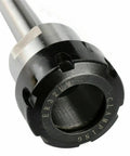 Close-up of a shiny metal ER32 collet from the 11 Piece ER32 Collet Set With MT2 Shank For Milling Machines Pro Grade Precision 0.0005 Tolerance.