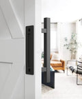 Close-up of Two Pack 12 Inch Barn Door Handles Set With Rustic Two Side Pull And Flush Sliding Design For Gates in Black Square Finish, installed.