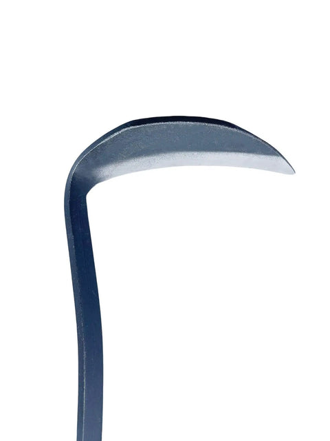 Close-up of the sharp edge of a Left Handed Garden Weeder Tool With Sharp Edge Sickle Hoe For Precision Weeding And Grass Cutting In Tight Spaces Ergonomic Lefty Tool For Quick Clean Garden Maintenance.