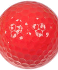 Bright Colored Mini Golf Balls Eight Pack For Practice And Fun For All Golfers Indoor And Outdoor Training red ball close-up.