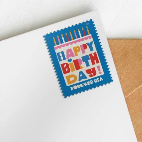 Birthday Forever Stamps 2026 Edition Two Sheets Of 20 Featuring An Oversized White Birthday Cake With Bright Colorful Candles For First Class Mail Postage showing a vibrant design with Happy Birthday text.