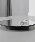 Stunning Mirrored Gold Electric Turntable For Jewelry And Accessories on a table with USB power cord and black base.