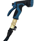 Brass Garden Hose Quick Connectors Three Quarter Inch GHT Male Adapters with blue hose nozzle attached.