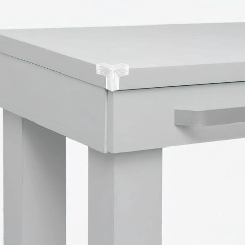 Close-up of 10 Pack Table Corner Guards For Kids And Pets, Soft PVC Edge Protectors on a desk corner, preventing scrapes and dings.