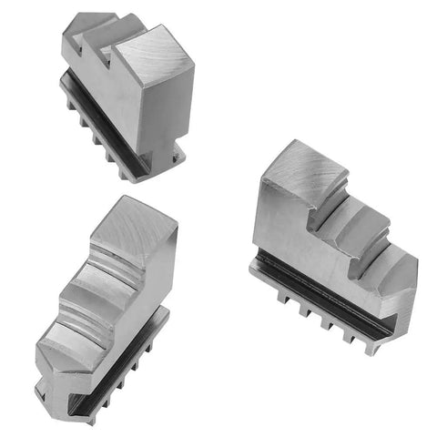 Precision Tuned Three Piece K1180 Self Centering Three Jaw Lathe Chuck Set For Metal Machining And Woodworking Shops showing individual jaws.