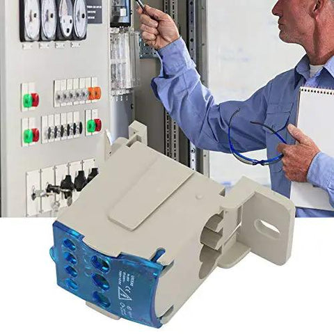 Rock Solid 80 Amp Din Rail Terminal Block Distribution Box With Fire Safe Housing For Heavy Duty Universal Wiring Hookups And Straightforward Power Drop mounted on electrical cabinet.