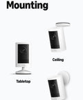 Tough As Nails Outdoor Security Camera With Long Lasting Battery And Hella Clear Retinal 2K Video Featuring Wide Angle Lens Plus 6X Digital Zoom And Crisp Night Vision To Keep Your Yard Secure All Day mounted on a wall and tabletop.