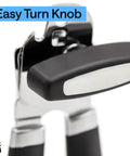 Close-up of Heavy Duty Stainless Steel Smooth Edge Manual Can Opener And Bottle Opener With Oversized Handheld Turn Knob Soft Comfortable Handle Multifunction Kitchen Tool Us Designed Black.