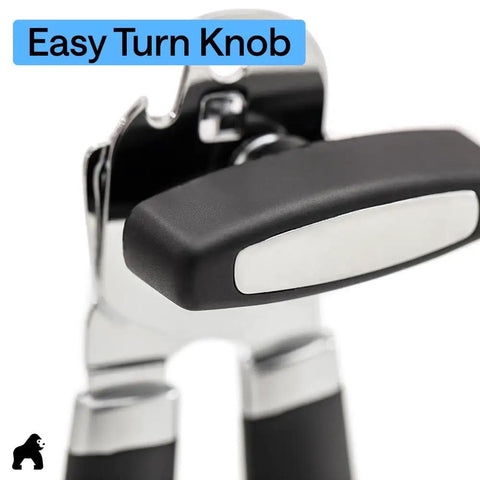 Close-up of Heavy Duty Stainless Steel Smooth Edge Manual Can Opener And Bottle Opener With Oversized Handheld Turn Knob Soft Comfortable Handle Multifunction Kitchen Tool Us Designed Black.