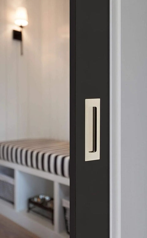 Modern Rectangular Flush Pull Handle In Flat Black Finish One And Three Quarters Inches Wide By Six Inches Long Sleek Minimalist Cabinet And Drawer Pull For Contemporary Kitchens And Bathrooms Durable Hardware With Hidden Mounting installed on a sliding door