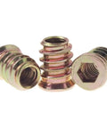 Twenty Pack M4x10mm Threaded Inserts For Wood, Tough As Nails Carbon Steel Screw In Furniture Nuts With Hex Wrench For Cabinet DIY Fixes And Gritty Rust Proof Assembly close-up, showing three threaded inserts.