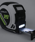 Rechargeable LED Light Tape Measure 25ft 1 Inch Tape With Slimline Case Nylon Coated Blade glowing in dark environment