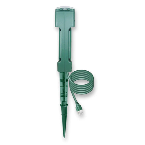 Heavy Duty Outdoor Power Stake With Three Grounded Outlets And Smooth Twist Socket Cover Featuring Dusk Till Dawn Photocell Timer No Sweat Setup All Weather Shielding For Yard Christmas Lights, vertical green stake with cord.