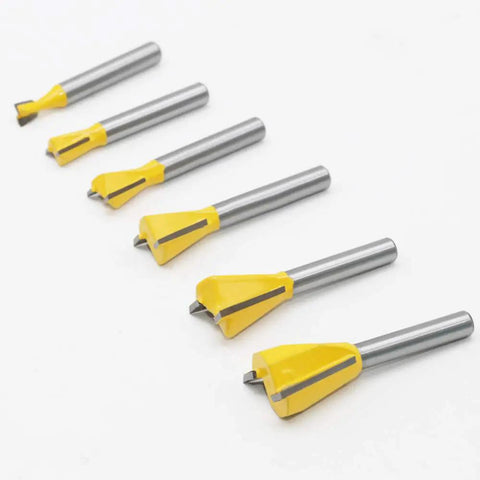 Premier Heavy Duty Dovetail Router Bit Set Six Piece Collection With One Quarter Inch Shank showcasing carbide blades in various sizes.