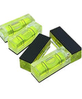 Top Tier 5 Piece Set Of Mini Magnetic Bubble Levels with green acrylic shell for quick layout on metal surfaces.