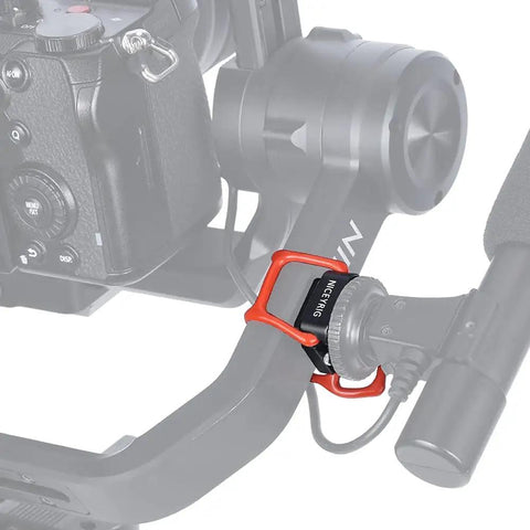 Beast Mode Hot Shoe Mount Adapter with Elastic Rubber Band wraps around gimbal arms for microphone support.