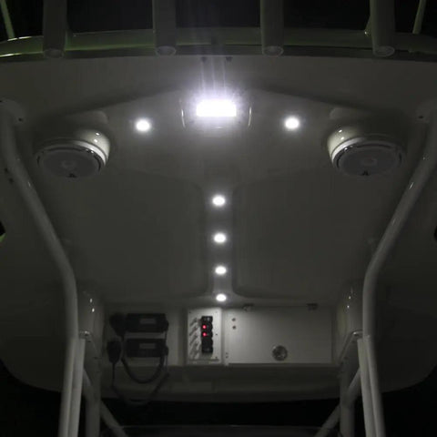 CapreraLT LED Cockpit Flood Deck Light With Bracket Mount illuminating boat cockpit, waterproof IP67, marine use.