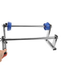 Manual Stretch Film Dispenser Stand For Shipping Supplies Hand Operated Wrap Film Holder With Metal And Plastic Construction Lightweight Yet Sturdy For Easy Desktop Wrapping And Efficient Warehouse Or Home Packing, hand-held metal frame