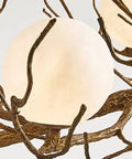 Close-up of Branch Design Ceiling Pendant Light Vintage Moon Art Chandelier 9 Light Array with glowing orb on metal branches