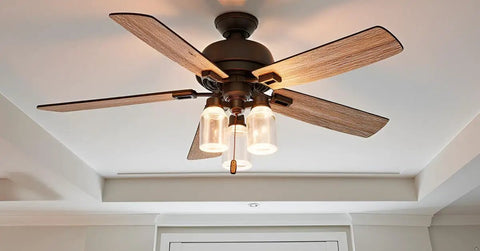 Lit Clear Ceiling Fan Glass Shade 3 Pack Kit installed on ceiling fan in modern room setting, showcasing jar-style design.