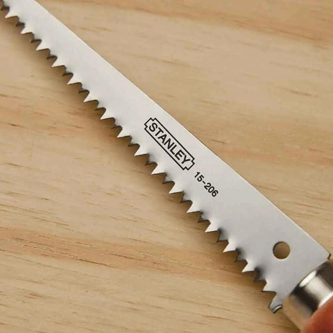 Close-up of 6-Inch Jab Saw with Wood Handle for Drywall and Plasterboard Cuts, showing epoxy bonded blade for durability.