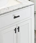 Matte Black 2 Inch Cabinet Knobs 30 Pack Stainless Steel Kitchen Cabinet Knobs With Round Edge installed on white bathroom drawers