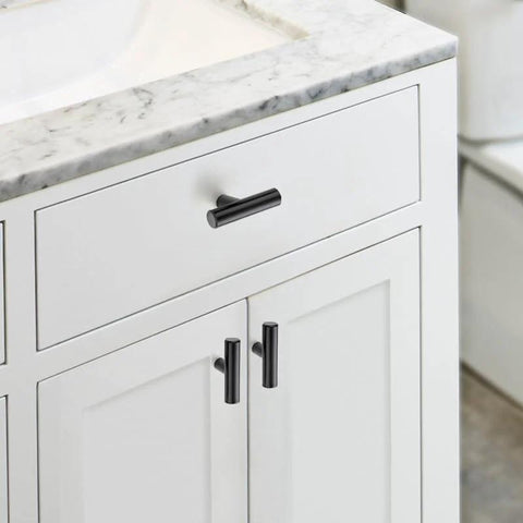 Matte Black 2 Inch Cabinet Knobs 30 Pack Stainless Steel Kitchen Cabinet Knobs With Round Edge installed on white bathroom drawers