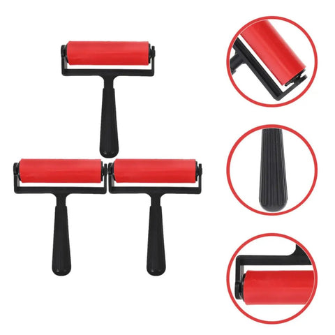 3 Piece Manual Stamping Ink Roller Kit Featuring A Super Silky Smooth Cylinder And Rugged Red Plastic Handle; three red and black rollers.