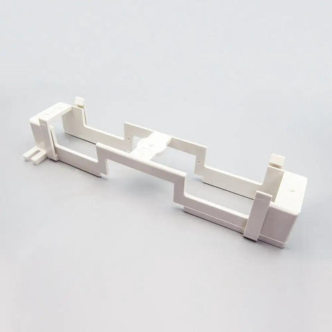 66 Block Punchdown Mount Bracket For Wall Installations, Standard B Bracket Design, Durable Flame Retardant UL 94V0 Plastic, Mounts 66 Punchdown Blocks Measuring 10 X 3.3 X 1.9 Inches, Easy Install And Secure Fit. White wall-mount bracket shown angled