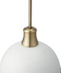 Close-up of Dope Modern Glam 1 Light Pendant Light with matte white dome and brass accents, ideal for kitchens and hallways.
