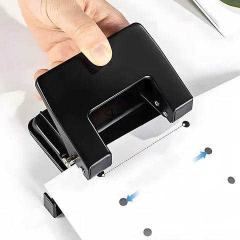 Heavy-Duty 2-Hole Punch Handheld Paper Punch for 20-Sheet Capacity With 50 Percent Less Effort and Built-In Waste Tray in use