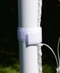 Close-up of Easy Set Soccer Goal 6 Foot By 4 Foot Portable Backyard Frame with self-stick net strap on rust-resistant steel pole