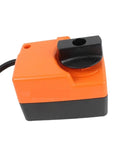 Close-up view of Kickass Ventilation Rotary Actuator 24 Volt Ac Dc Motor 2Nm Torque, featuring black and orange design.
